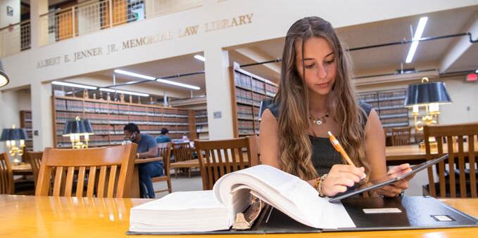 Student working in the law library